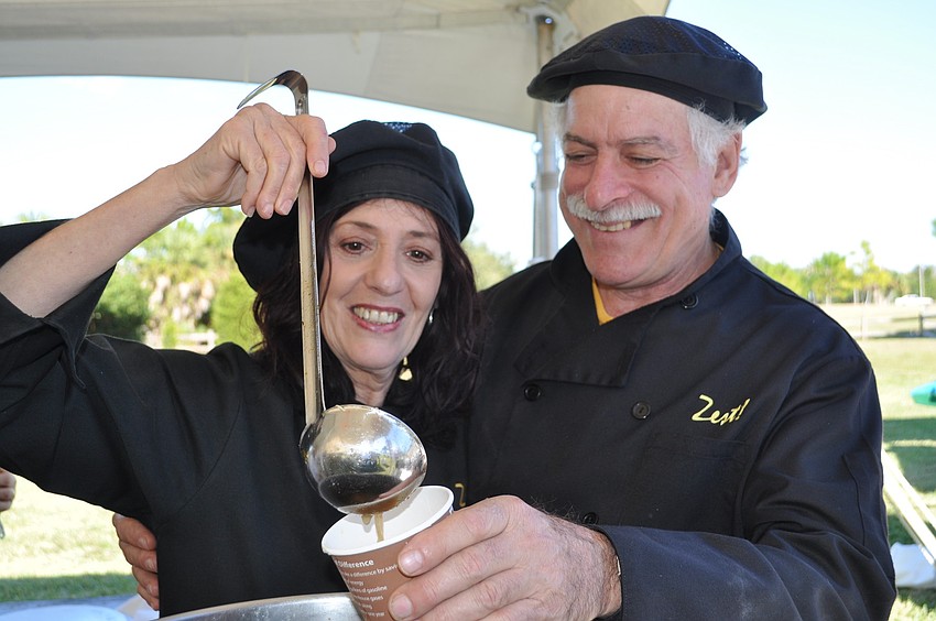 Nina and John Arico, owners of Zest! of Sarasota, serve up some tortilla soup.