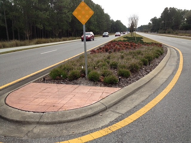 The medians on State Road 100 are designed to look like this one, at Pritchard and Belle Terre.