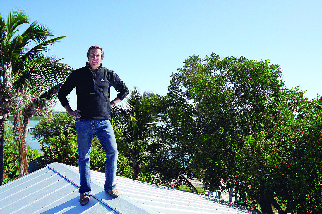 Mar Vista Dockside Restaurant & Pub owner Ed Chiles shows off the view from his restaurantÃ¢â‚¬â„¢s roof.
