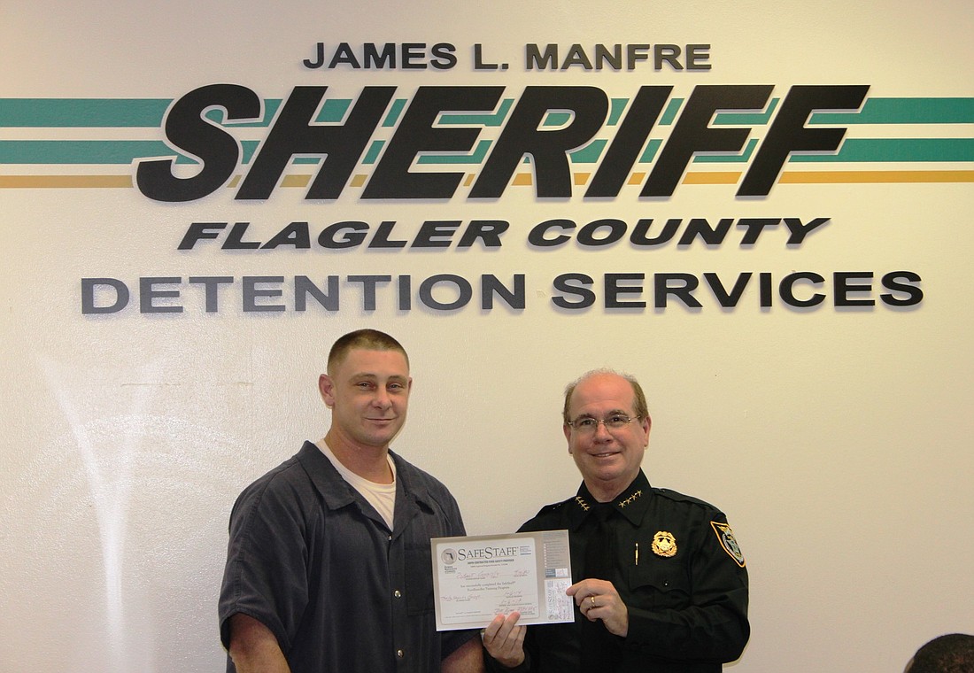 Flagler County inmate Robert Connolly and Flagler County Sheriff Jim Manfre COURTESY PHOTO