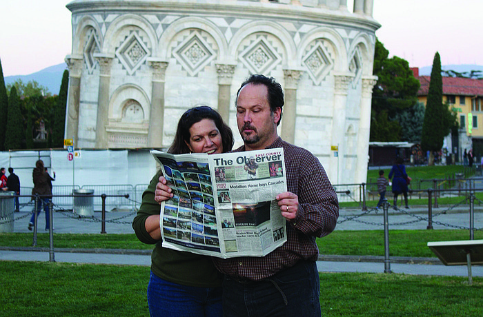 Grand-prize winners: Lisa and Tim McElhiney earned 2,814 votes for this photo with The East County Observer at the Leaning Tower of Pisa.