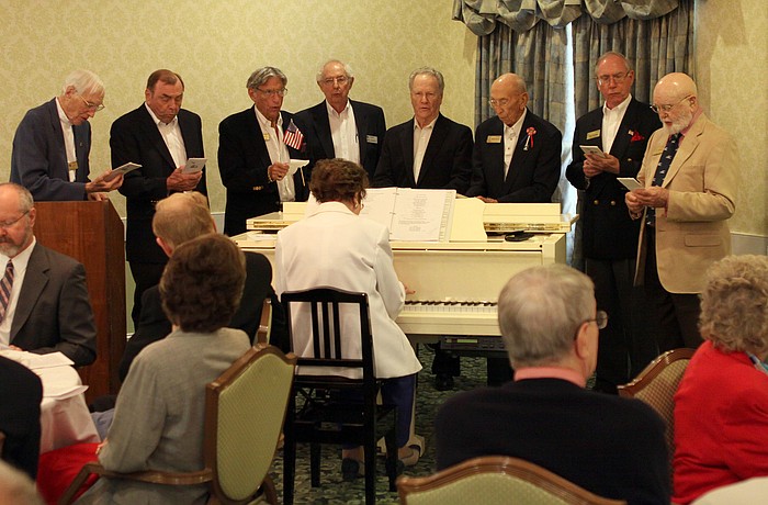 The Glen Men singers perform for the crowd.