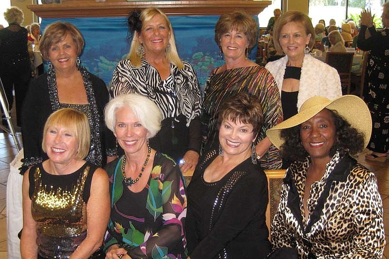 Clockwise from bottom left: Barbara Beam, Pat Abbotoy, Paula Kelly, Michel Callahan, Rose Vinopal, Margie Jaudon, Jeanne Larranaga and Norma Lake