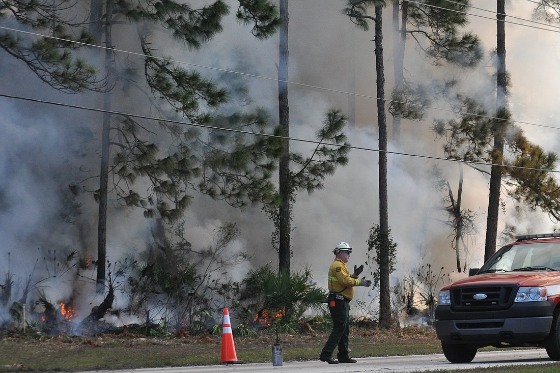 The fire was first addressed by a fire engine from the Flagler County Airport. (Brian McMillan)