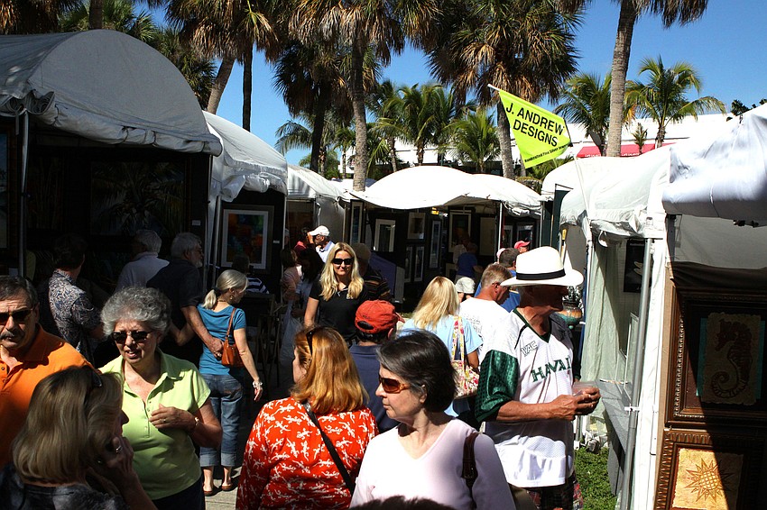 Thousands of people wander the Circle during the 21st annual St. Armands Art Festival.