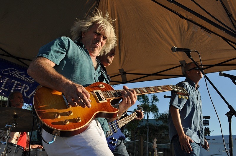 Musician Jim Camastro performs with Goodbyeddie as part of the festivities.