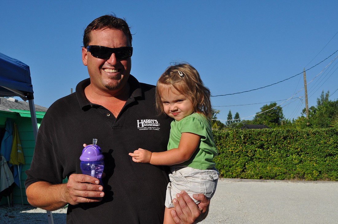 Harry's General Manager Hal Christensen and his daughter, Ella, at last month's wine tasting.