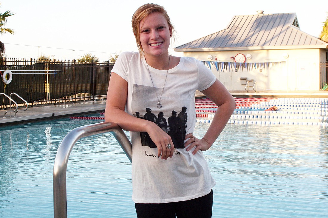 Ashley Reid started swimming after her mom's suggestion.