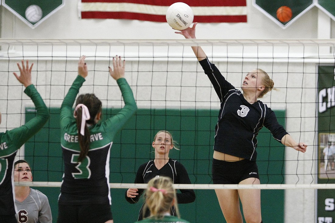 Junior outside hitter Emily Karg goes up for a block during Braden River's regional final match against Fort Myers Nov. 13.