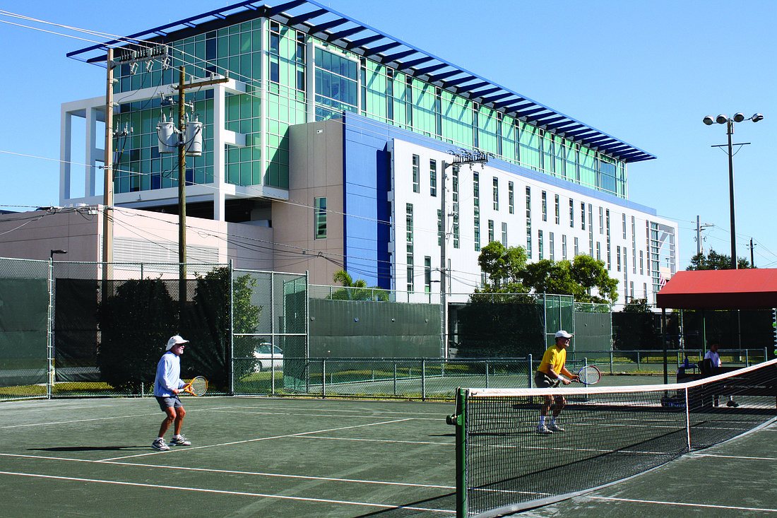 Some tennis players have refused to play on the three courts nearest to the police headquarters, because the air-conditioner noise is too loud for them.