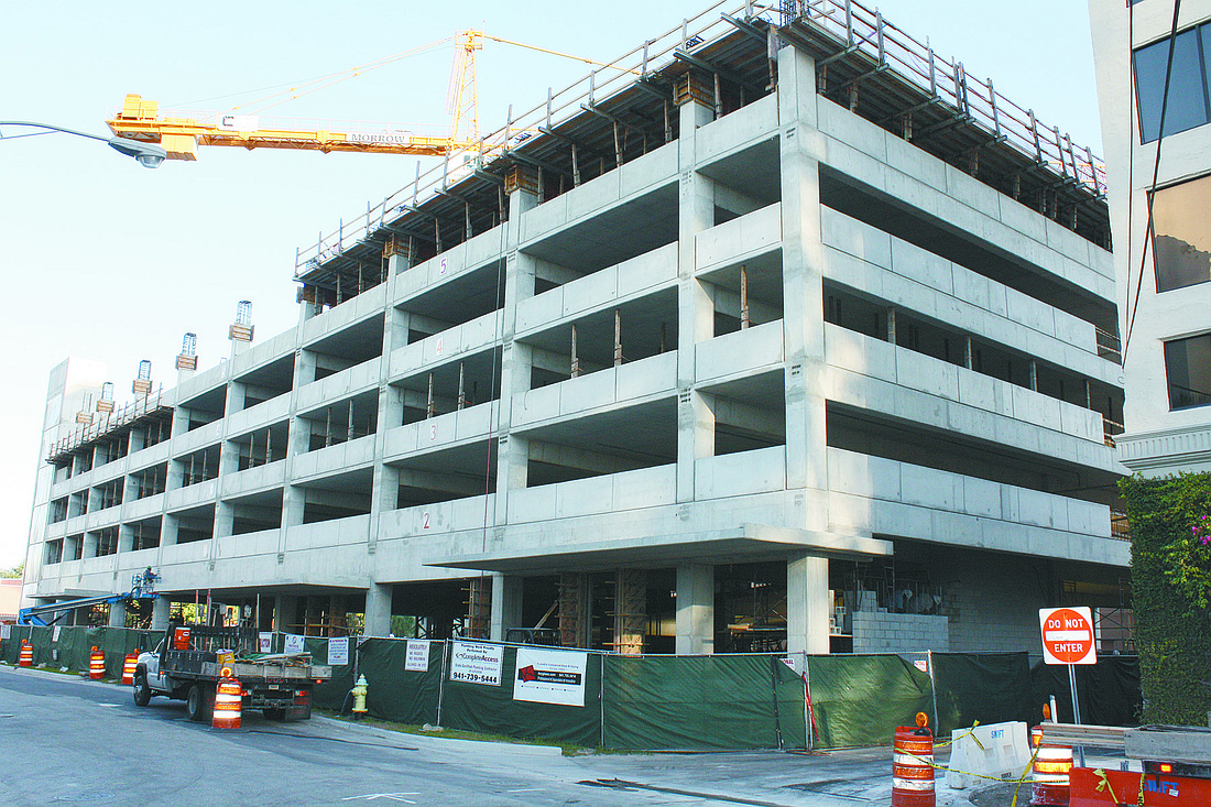 The completion date of the 287,000-square-foot parking garage is slated for December.