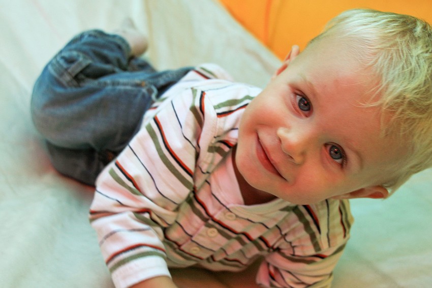 Gregorie Ritzenthaler loved climbing through the bounce house. Photo by Jamie Moriarty.