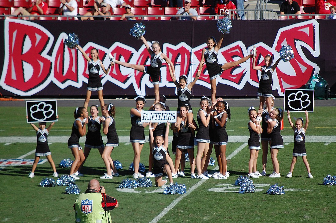The squad performed to ACDC's "Back in Black."
