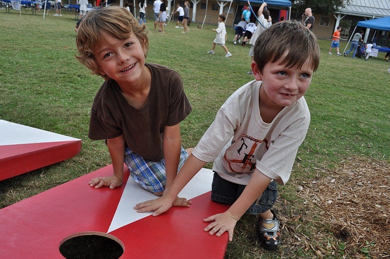 Adrian Eidge and Jack Warner, both 6, created their own version of the game corn hole.