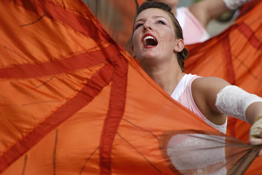 Danielle Petersen and the color guard added visual elements to complete Lakewood's show.