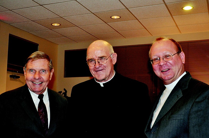 The Rev. Bruce Porter, Msgr. Gerry Finegan and the Rev. Mark Bernthal
