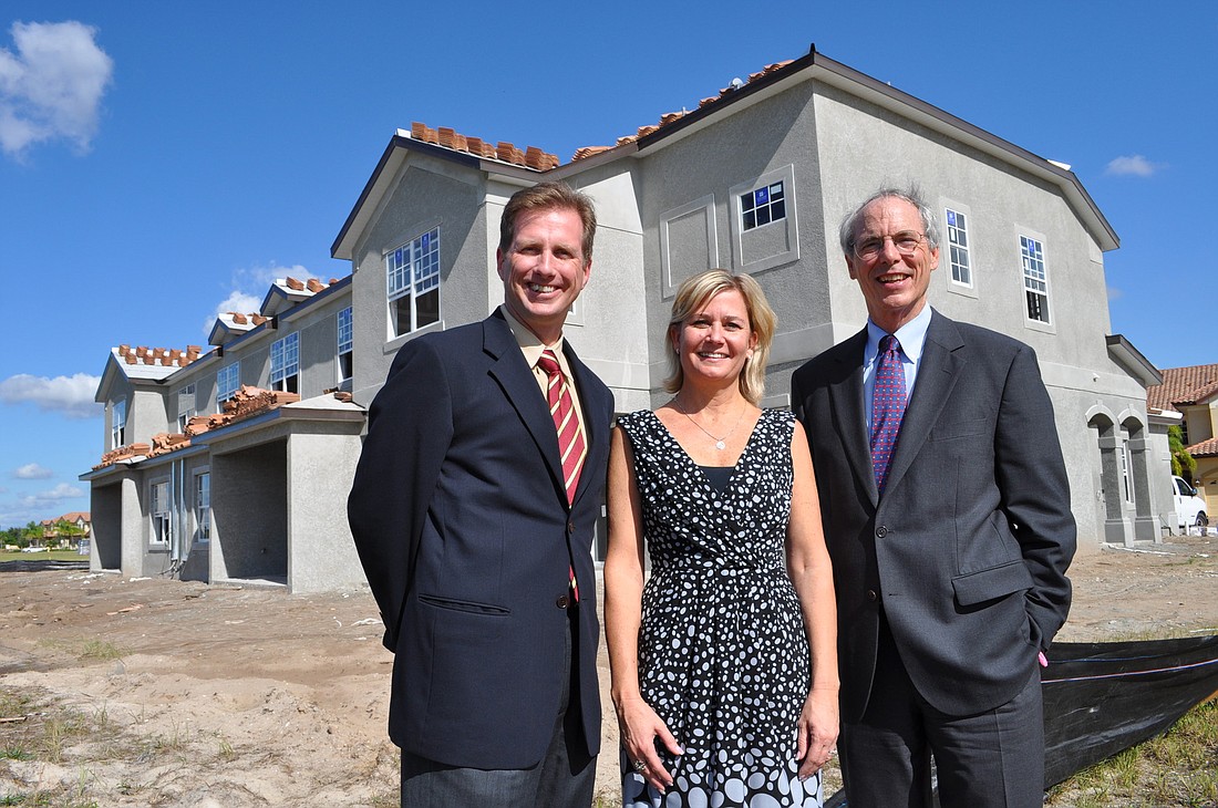 Neal Communities' David Hunihan, Whitney Ellis and Pat Neal are eager to start home sales in the community.