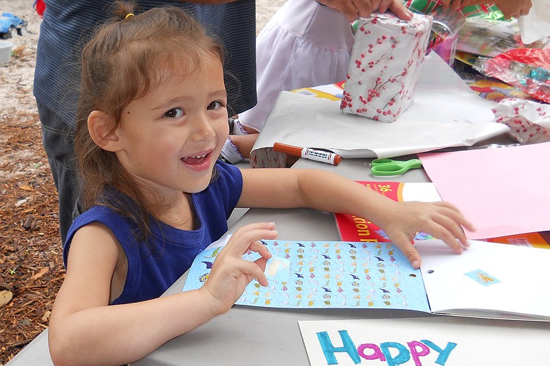 One grateful family will be getting a custom holiday card from East County preschooler Lily Schlosberg this year.