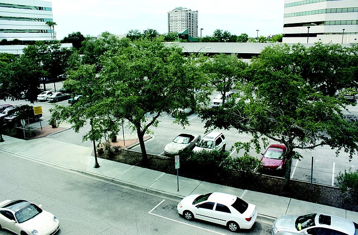 If city commissioners agree to a change in the Pineapple Square agreement, City Hall would be obligated to build a parking garage on the State Street parking lot.