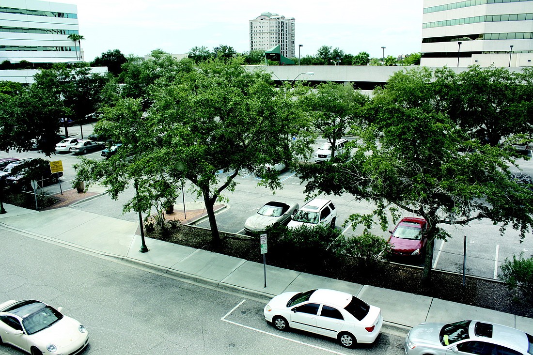 If city commissioners agree to a change in the Pineapple Square agreement, City Hall would be obligated to build a parking garage on the State Street parking lot.