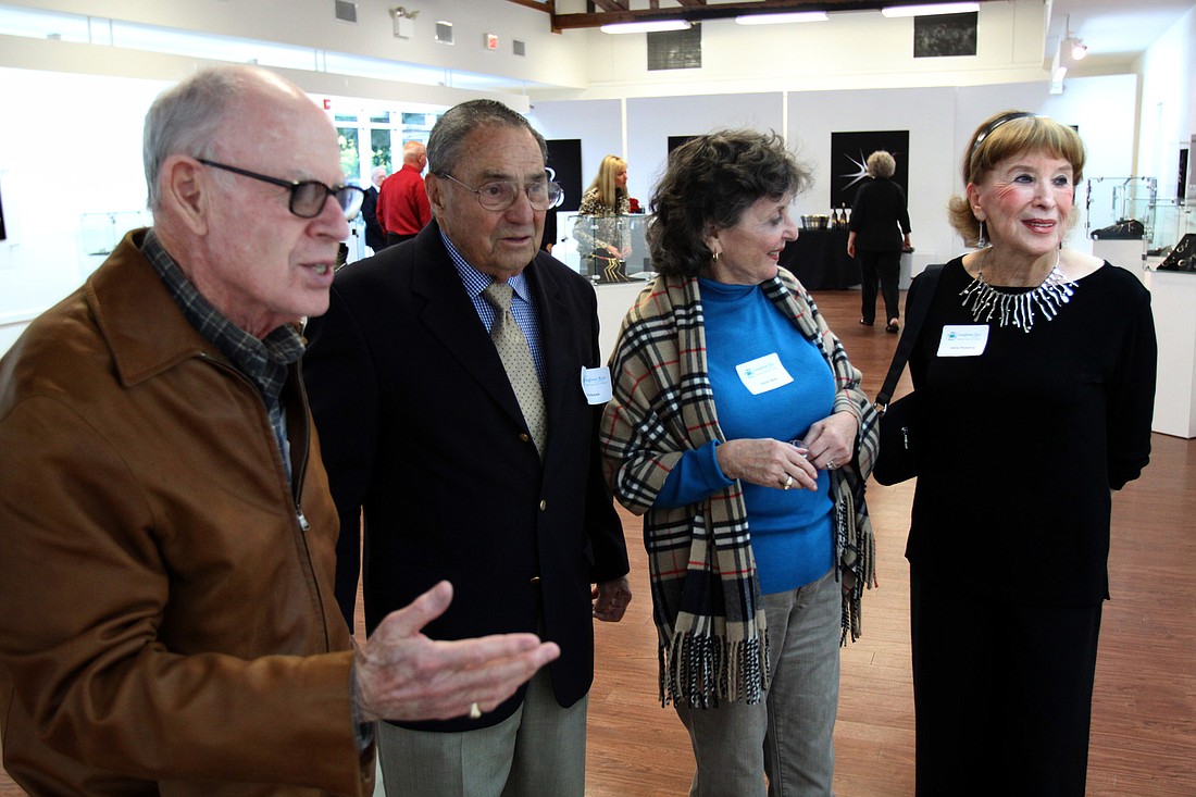 Marvin Black talks to Ed Brickman about BrickmanÃ¢â‚¬â„¢s work inspired by a picture drawn by BrickmanÃ¢â‚¬â„¢s grand-niece as Annette Black and Gloria Weissberg admire the work.