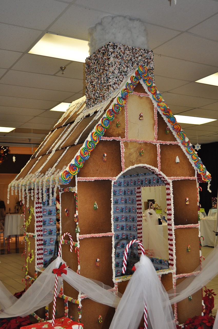 This giant gingerbread house is made from 100 pounds of candy and 50 pounds of icing.