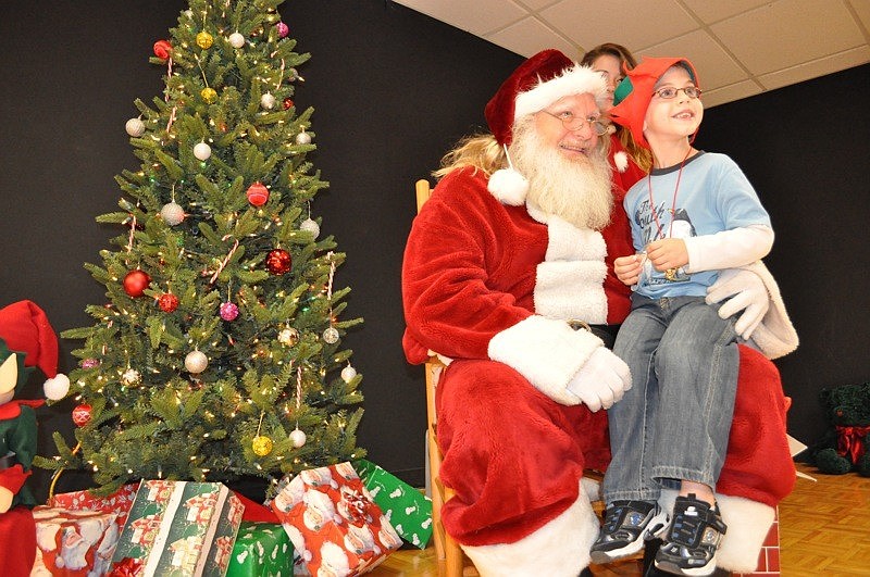 Austin Buckstein, 5, wanted to have his picture taken with Santa alone.