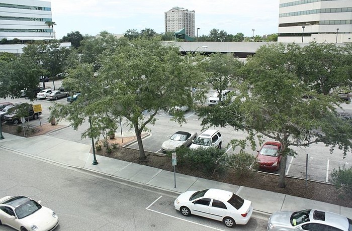 Within four years, the city will build on the State Street parking lot a garage with at least 300 spaces.