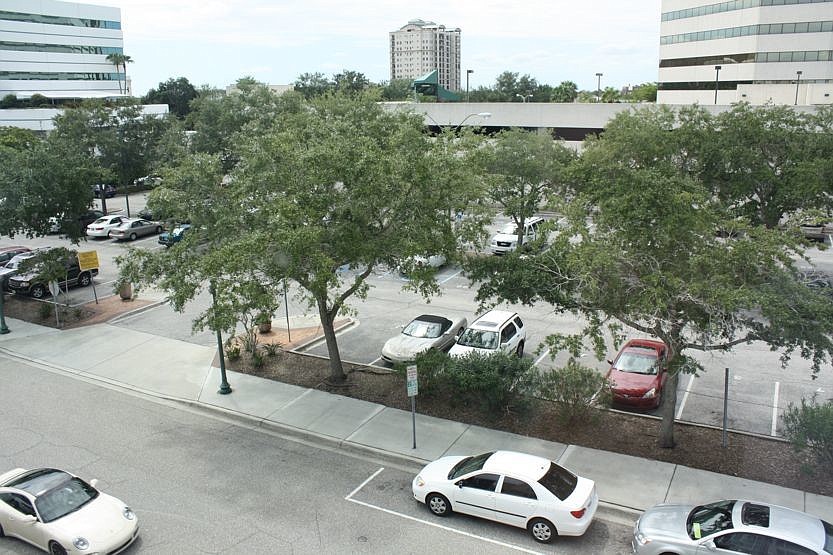 Within four years, the city will build on the State Street parking lot a garage with at least 300 spaces.