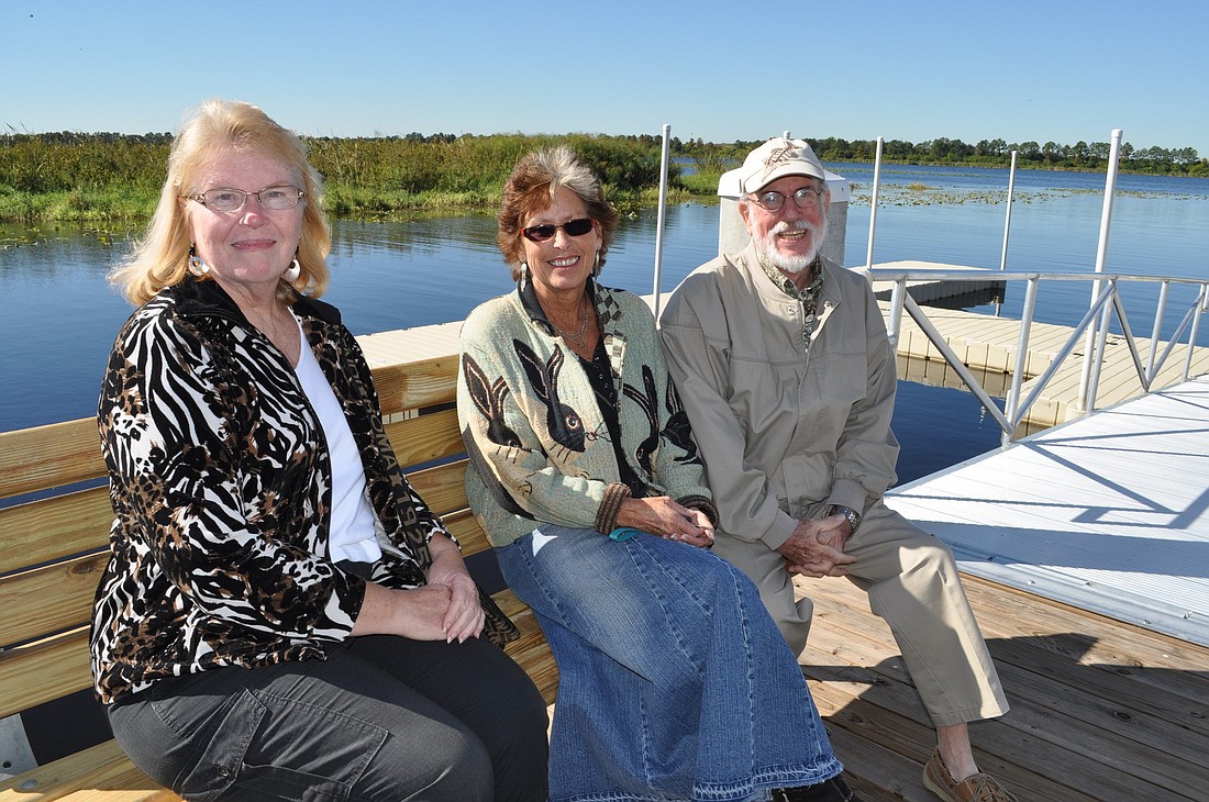 Carolyn Sutherland, Peggy Christ and Bill Halstead, members of the Old Braden River Historical Society, are thrilled with the new facility and its opening.