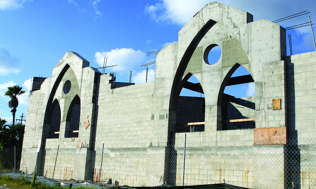 The structure for the church's windows are in place.