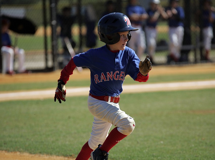 Second baseman Dawson Ganong races down the line after hitting a single.