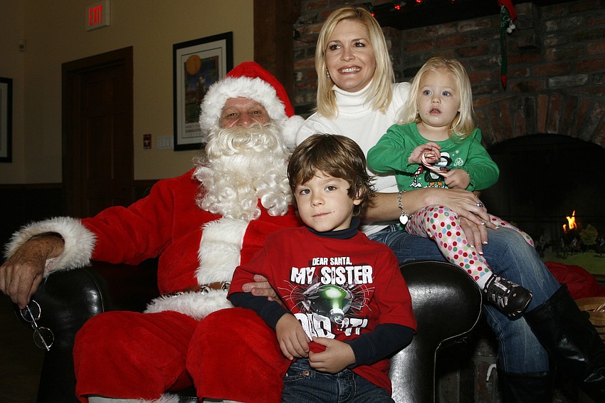 Ellie Dauphas brought her children, Ty and Daphne, to visit Santa.