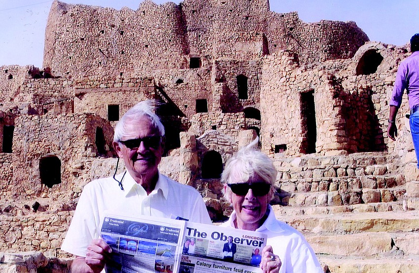 LIBYA. This is not a mirage â€“ The Longboat Observer even travels to deserts. Town and Carol Mink brought their Observer with them on an October trip to the Sahara Desert. The Minks are pictured in the Berber village of Kabao, Libya.
