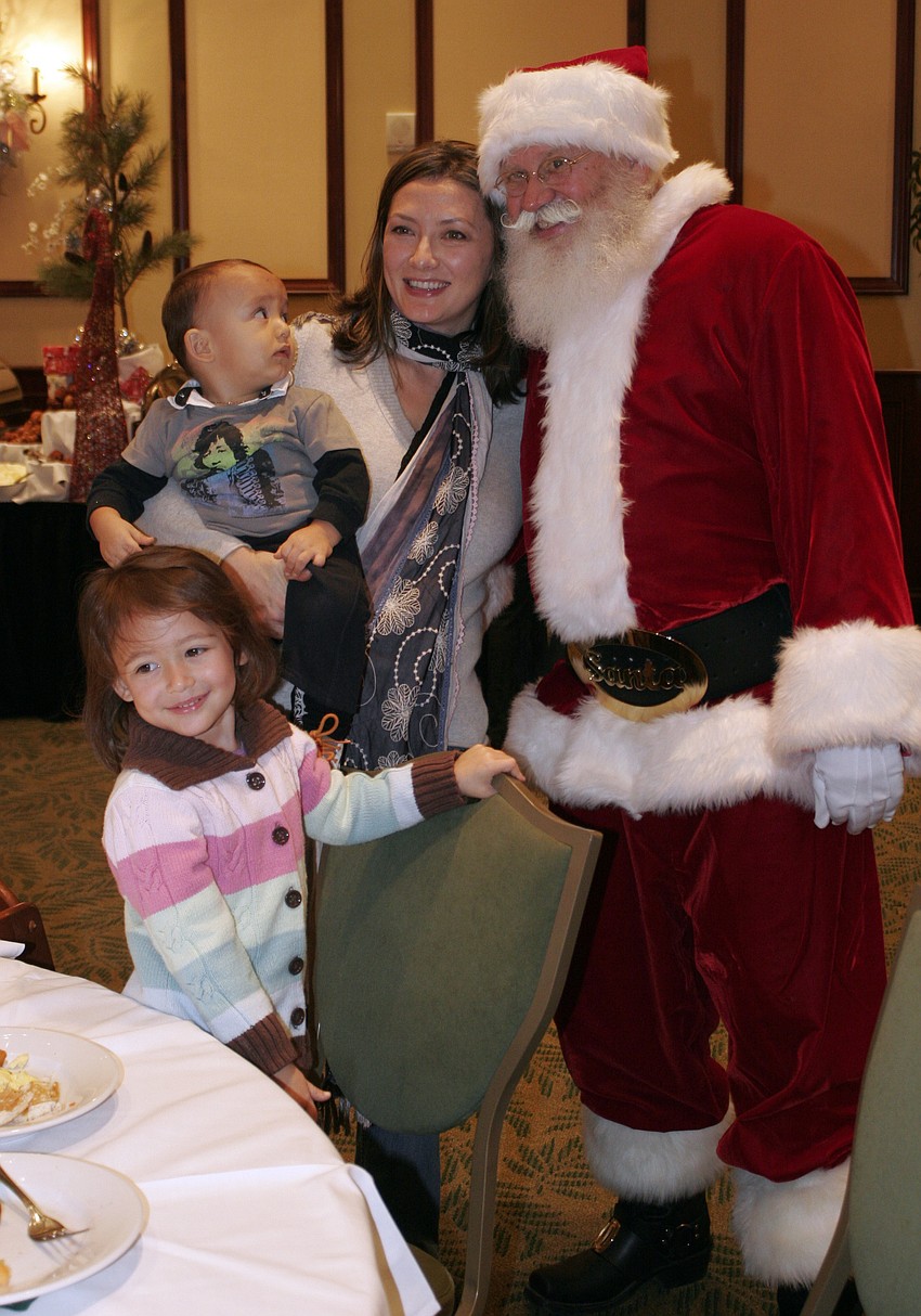 Kim Schlosberg and her children Lily, 3, and Luca, 1, enjoyed visiting with Santa.