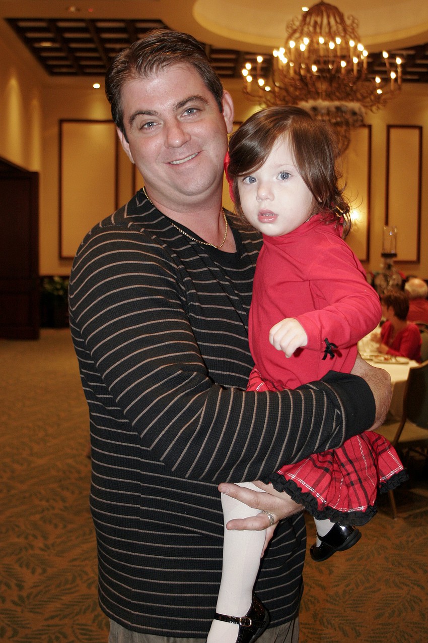 Chris Donnelly brought his daughter, Emma Grace, who is almost  2 years old, to see Santa.