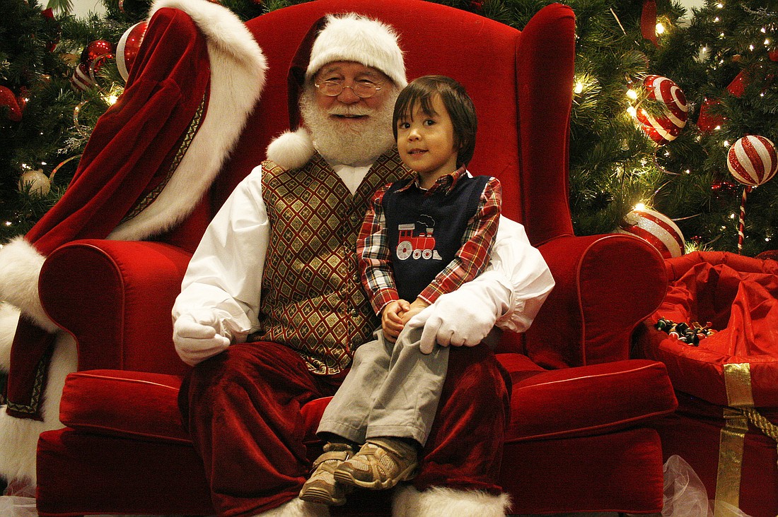 Regular readers of The East County Observer may remember that Lyric Eng's first two Santa visits did not go so well. I am happy to report Santa's reign of terror over our boy has ended.
