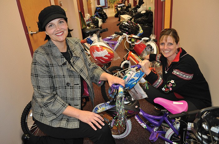 Lori Bower of Lakewood Ranch and Beth Grogan of River Club organized a toy drive for more than 130 children at Rowlett Elementary.