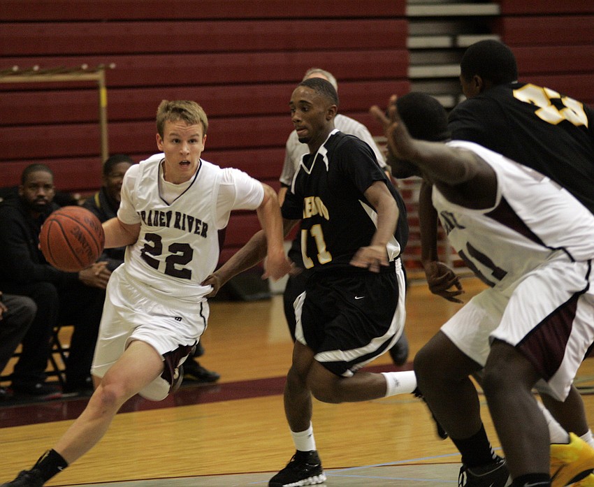 Tommy Bernhardt attempts to get past a Lakewood defender.