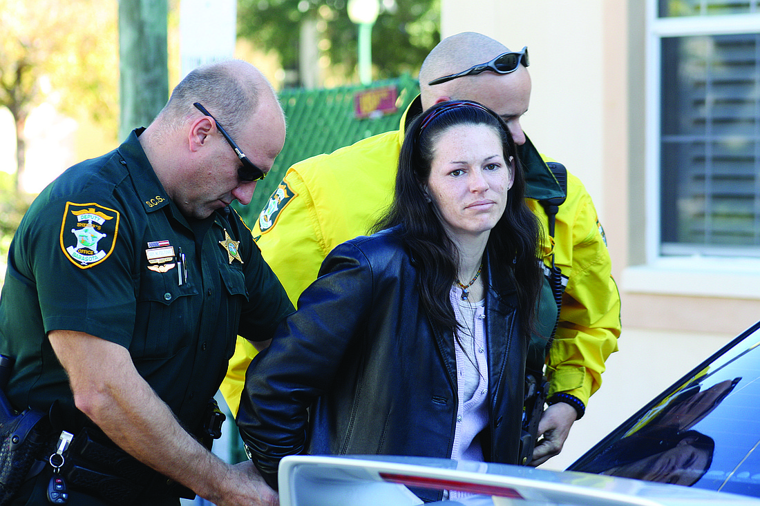 Dina King, 32, was arrested as she began to drive down Ringling Boulevard, not five minutes after she left a courtroom, where she was fined for driving with a suspended driver's license.