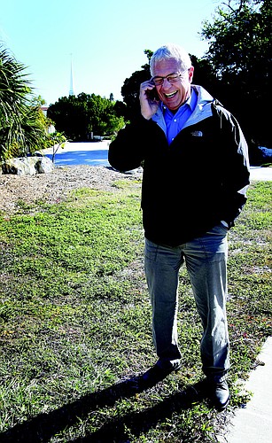 Longboat Key resident Jim Eatrides is confident a cellular tower will fix the communication issues that exist on the north end of the island. The tower he proposes would sit behind the Longboat Island Chapel, which is visible in the background.