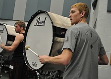Lawrence Ingerly practices on the bass drum line.