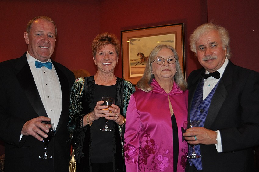 Promenade manager, Bob and Cindy McFarlin and Bonnie and Ron Lucchino