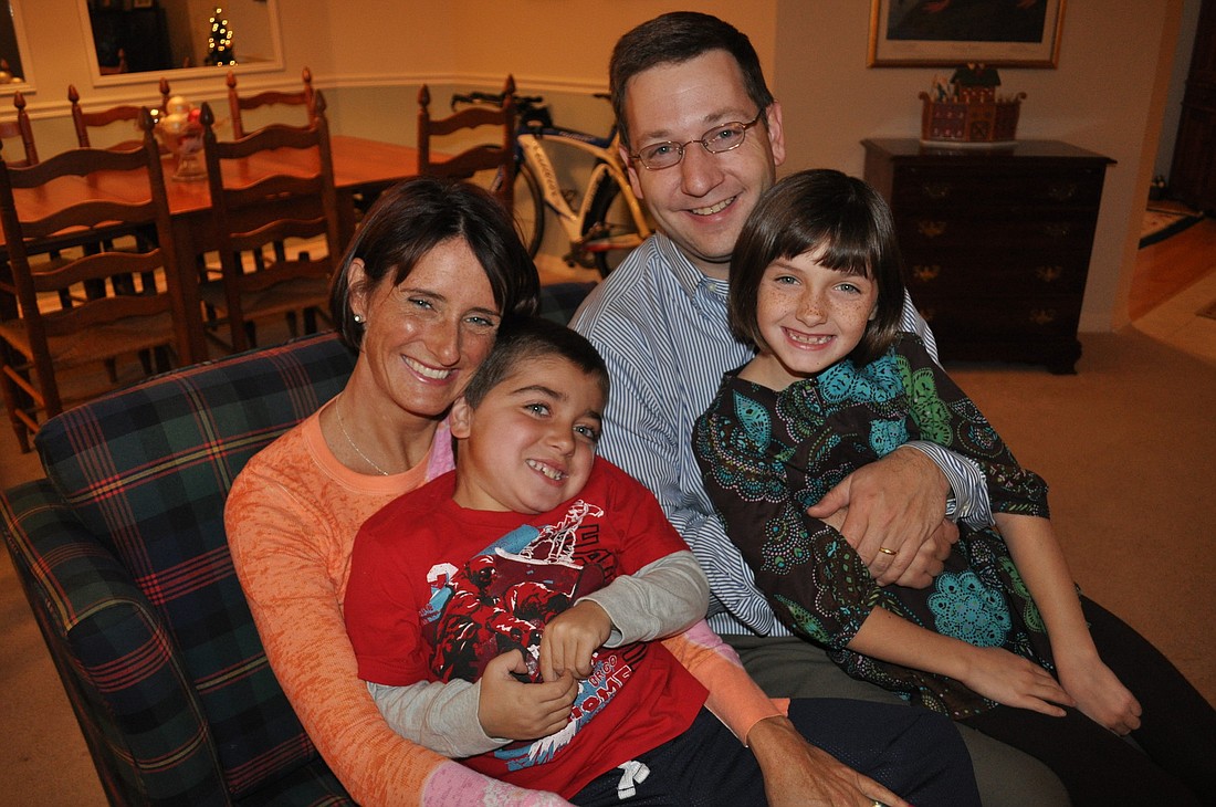 Jennifer and Nick Tullio with their twin children, Grayson and Emma. Grayson has Duchenne muscular dystrophy and the couple is hopeful, through research, a cure for the condition soon may be found.