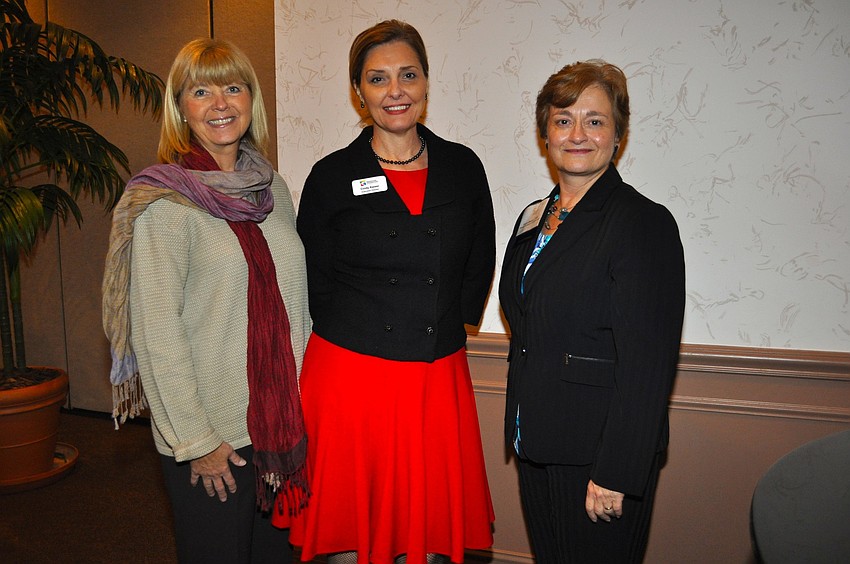 Pam Truitt, guest speaker and initiative manager for The Patterson Foundation, Cindy Kaiser and Laura Breeze, president of AFP Southwest Florida Chapter