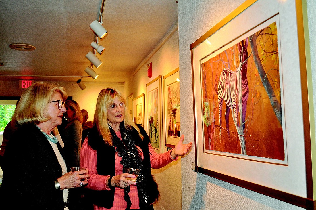 Heidi Thomas, left, meets artist Susanna Spann.