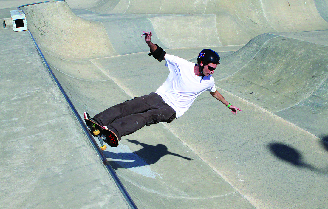 Jim Taylor enjoys riding his skateboard Saturday afternoon, at Payne Park's skate park.