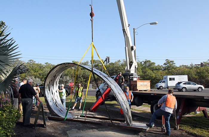 The Wave 2 Me sculpture gets put into place at the entrance to Longboat Key Club & Resort Islandside on Wednesday, Jan. 19. The sculpture was previously located at the Longboat Key Center for the Arts.
