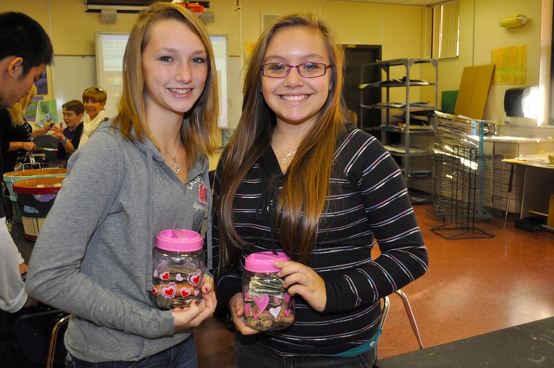 Brittany Targaszewski and Jovana Christiani are filling their jars with money through Feb. 3.