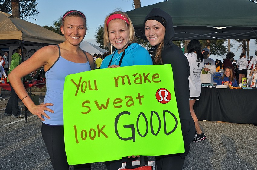 Alli Koski, Amy Zych and Courtenay Hitchon get pumped up for the Ringling Bridge Run.